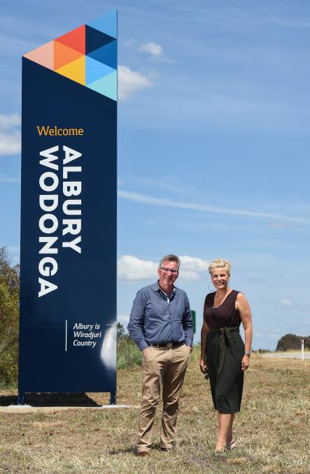Flashback: Albury mayor Kevin Mack and his counterpart Anna Speedie in October at the first sign unveiled at the northern entrance to the Twin Cities on the Hume Freeway.