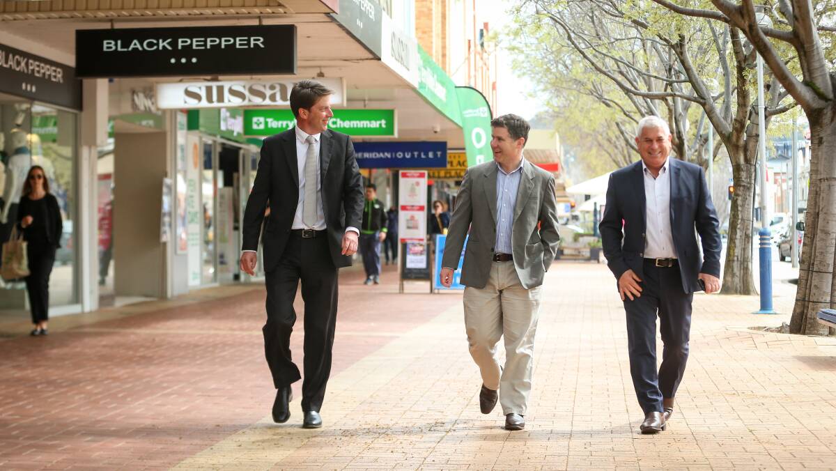 More positive: commissioner Chris Lamont, Albury MP Justin Clancy and Business NSW regional manager Andrew Cottrill in Dean Street. Picture: JAMES WILTSHIRE