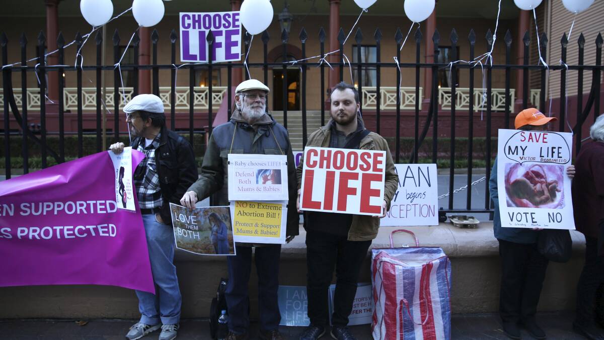 Emotive issue: Pro-life supporters outside Parliament House in Sydney on Monday ahead of debate this week on decriminalising abortion in NSW.