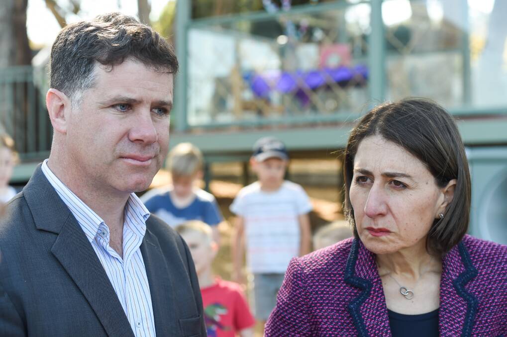 I've heard you: Gladys Berejiklian with her Liberal Party colleague Justin Clancy on a previous visit to Albury. She says she appreciates the concerns of border residents about the closure of the boundary with Victoria.