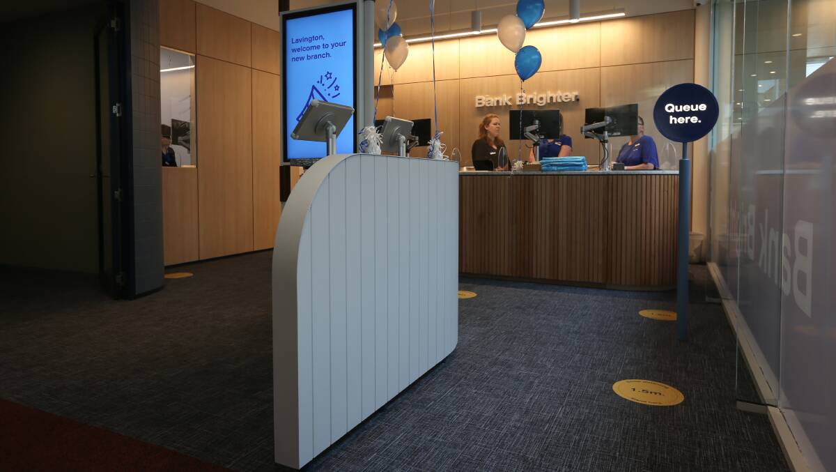 Follow the yellow spot road: Stickers alerting clients to stay 1.5 metres apart were evidence of Lavington's new Hume Bank branch opening amid the coronavirus outbreak. Picture: JAMES WILTSHIRE