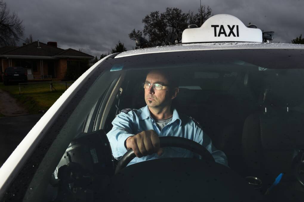 Mobile candidate: Wodonga taxi owner-operator Scott Cowie is looking to swap his driver's seat for the red benches of the Upper House by standing for the Legislative Council. Picture: MARK JESSER 