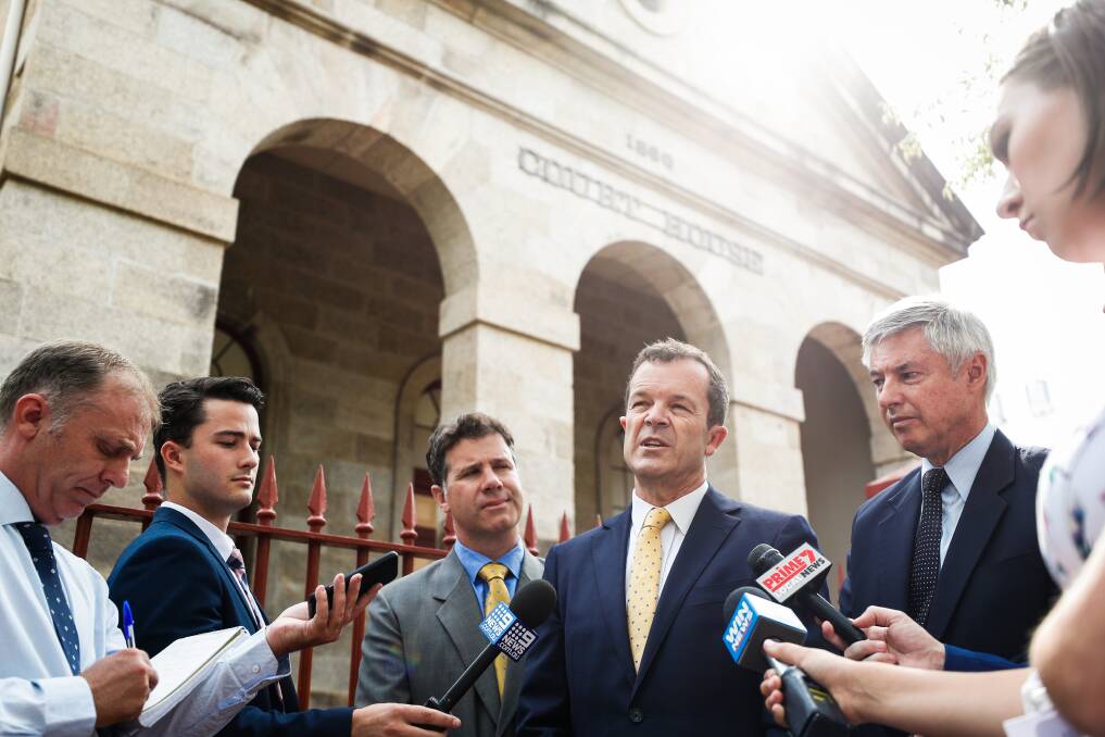 Verdict: Attorney-General Mark Speakman, flanked by candidate for Albury Justin Clancy and MP Greg Aplin at Albury's historic court house. Picture: JAMES WILTSHIRE