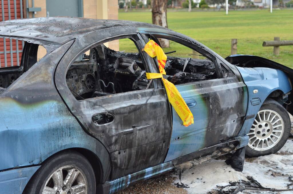 Ugly outcome: A car which was torched at Sarvaas Park in North Albury last month.