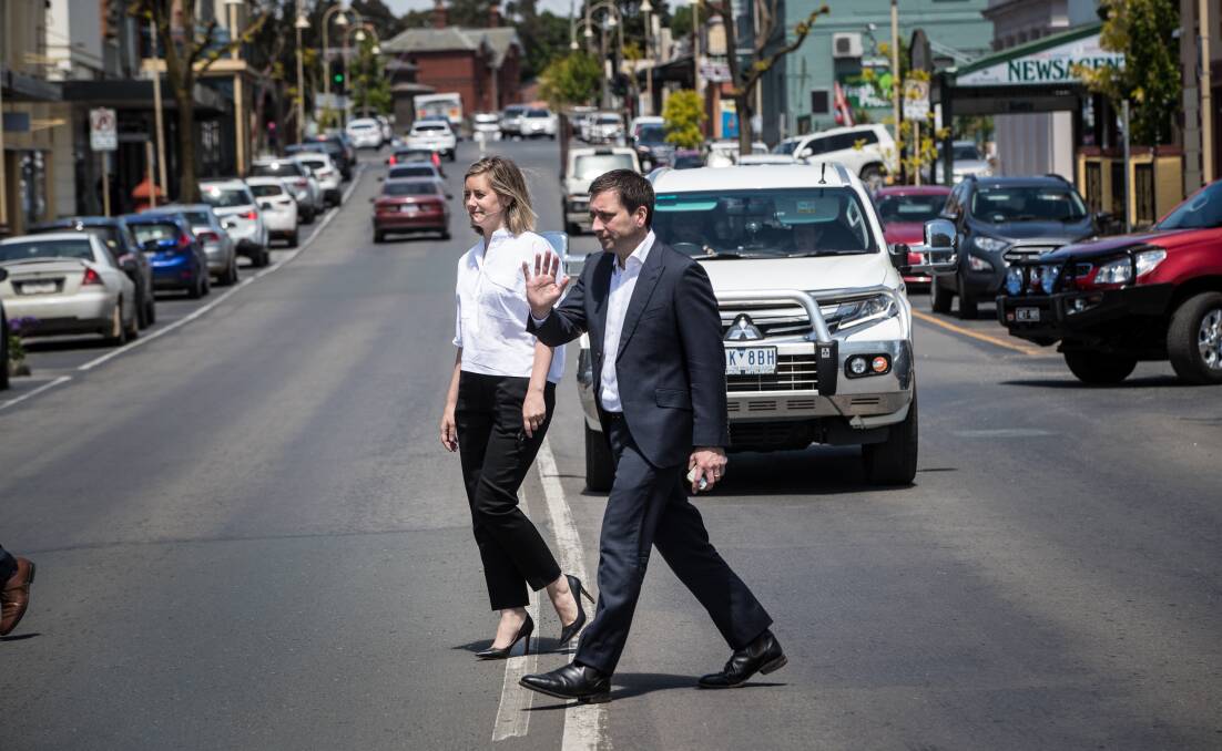 Striding on: Steph Ryan with Matthew Guy in the main street of Kilmore during the recent Victorian election. Ms Ryan was on Monday re-elected as the deputy leader of the Nationals, while Mr Guy has quit as leader of the Liberal Party in the state. 