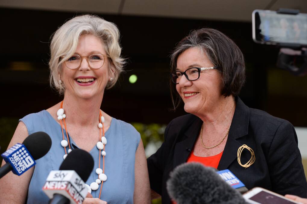 Baton change: Anointed orange independent Helen Haines with member for Indi Cathy McGowan on Monday when the MP announced her retirement.