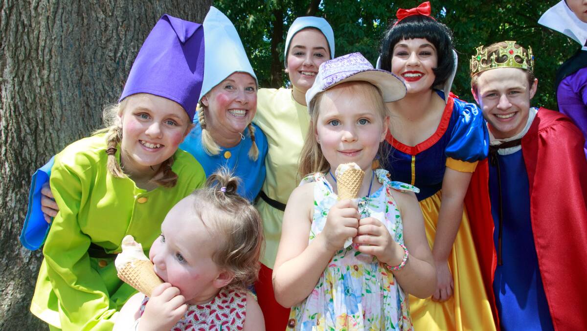 ﻿Cool day: Friends Stevie Barker, 2, and Indi Heffernan, 5, enjoyed meeting Snow White and some of her dwarfs at the Albury Botanic Gardens yesterday. Picture: SIMON BAYLISS