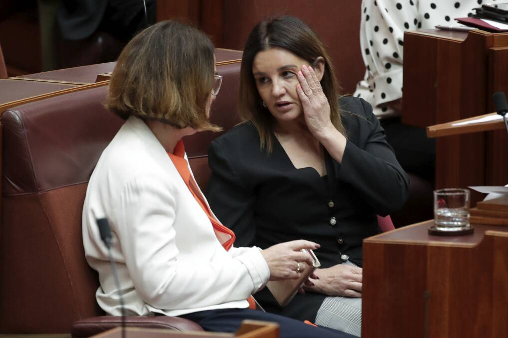 Tensions high: Government minister and senator Anne Ruston speaks to Tasmanian independent Upper House MP Jacqui Lambie amid debate on the repeal of medevac legislation. 