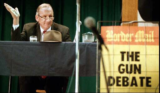 Heated situation: Tim Fischer faces up to an at times angry meeting in Wodonga in 1996 in response to the national gun crackdown after the Port Arthur massacre.