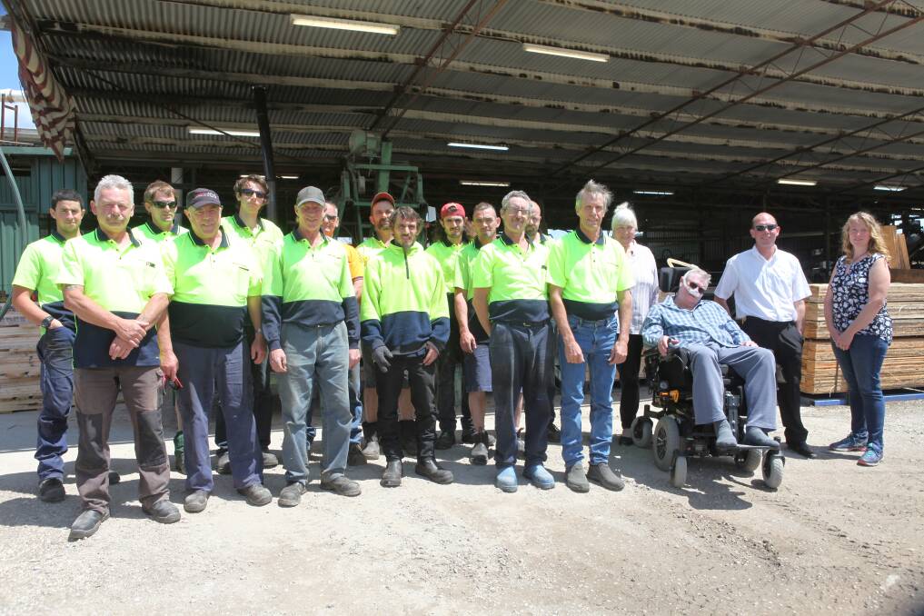 Left in limbo: Mill workers at Corryong with managing director Graham Walker (far right). They face losing their jobs due to the Victorian government ending hardwood processing in Victoria. Picture: CORRYONG COURIER