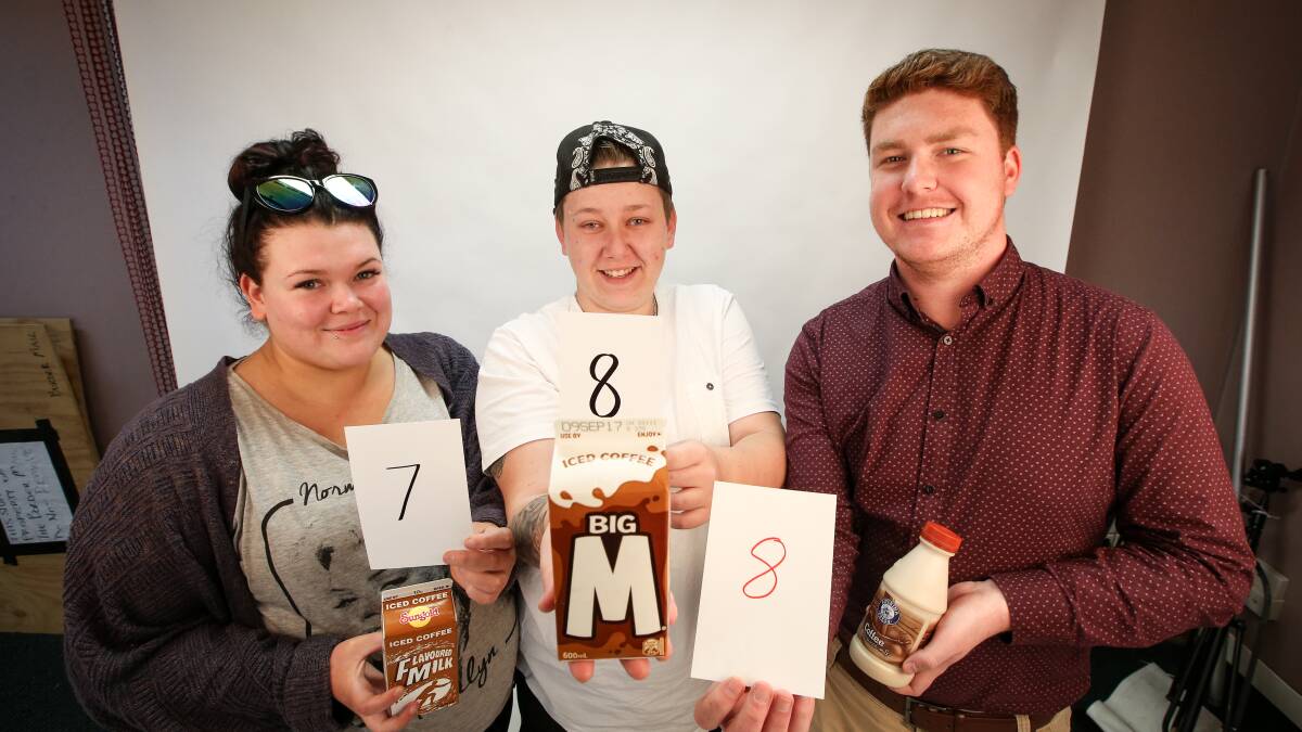 Milk markers: Billie Styles, Drew Smyth and Chris Young with their scores for Big M's iced coffee which outranked the Sungold and Riverina Fresh versions of the same flavour. Picture: JAMES WILTSHIRE
