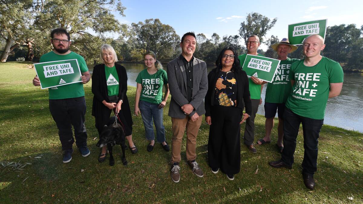 With his team: Dean Moss with Greens senator Mehreen Faruqi and his Albury supporters at the Murray River last month.