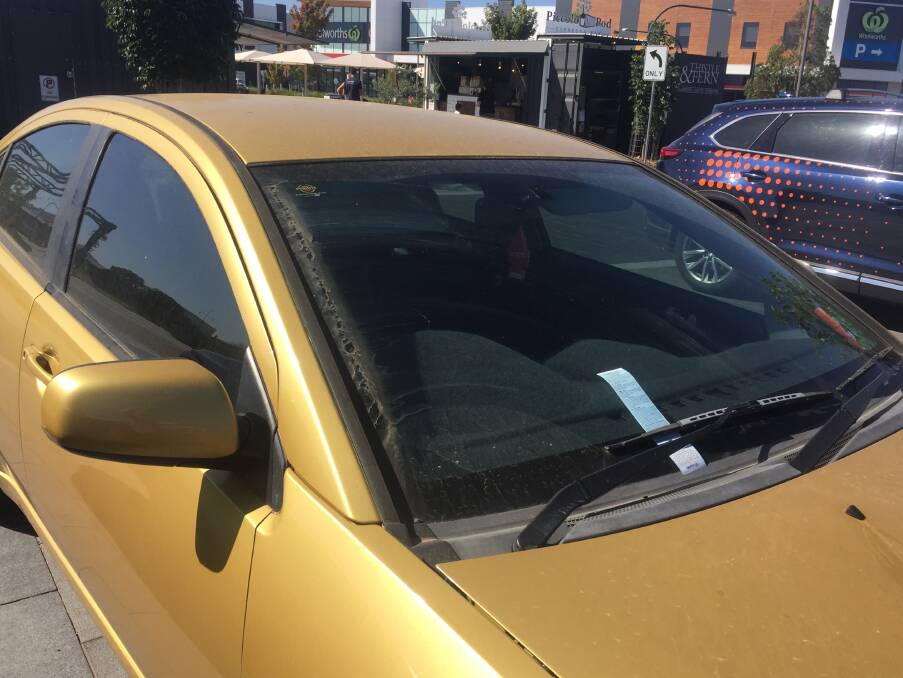 Caught out: A car parked in the no-standing zone in Wodonga's Junction Square on Monday morning with a council-issued warning ticket.