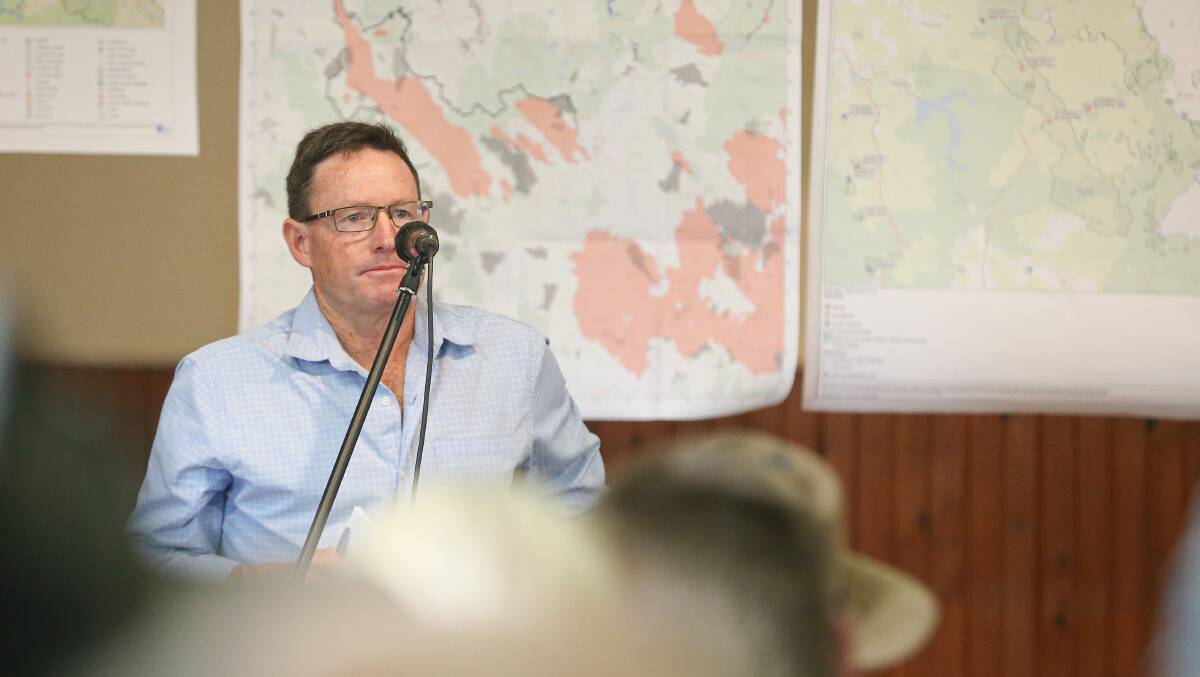 At the microphone: Towong mayor David Wortmann speaks at a community meeting at Tallangatta before he travelled to Mitta for a similar forum. Picture: JAMES WILTSHIRE