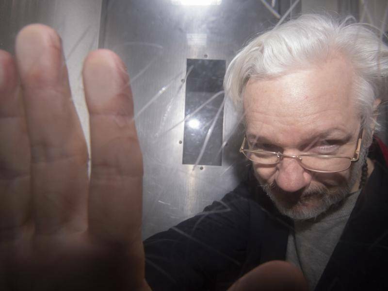 Awaiting fate: Julian Assange remains uncertain of his final extradition outcome, with the US government appealing a decision by a British judge to stop its bid to have him transported to America to face charges.