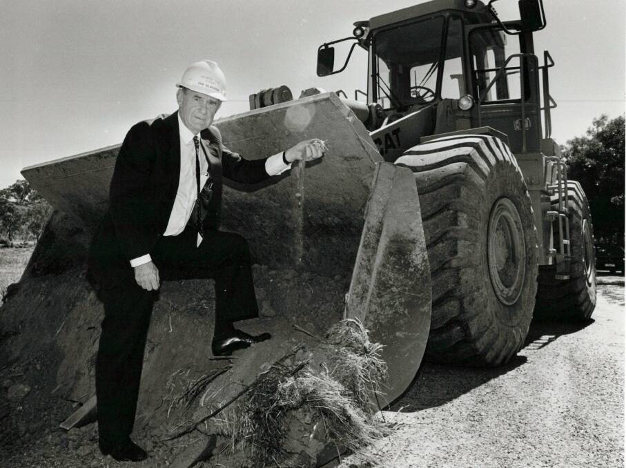 Then member for Albury Ian Glachan with a bulldozer on the site of Albury hospital in January 1991 when he turned the first sod. 