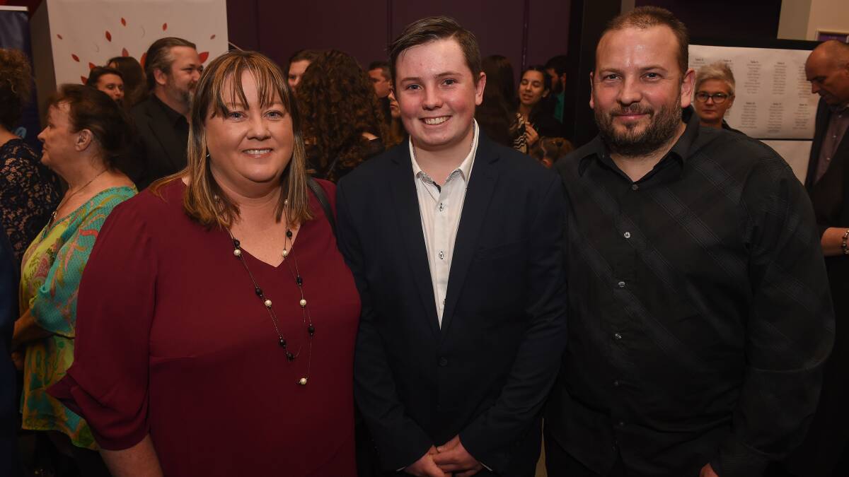 Proud parents: Katrina and Paul Redcliffe with their son Jack who was bestowed the advocacy and action award for his dedication to helping others. Picture: MARK JESSER
