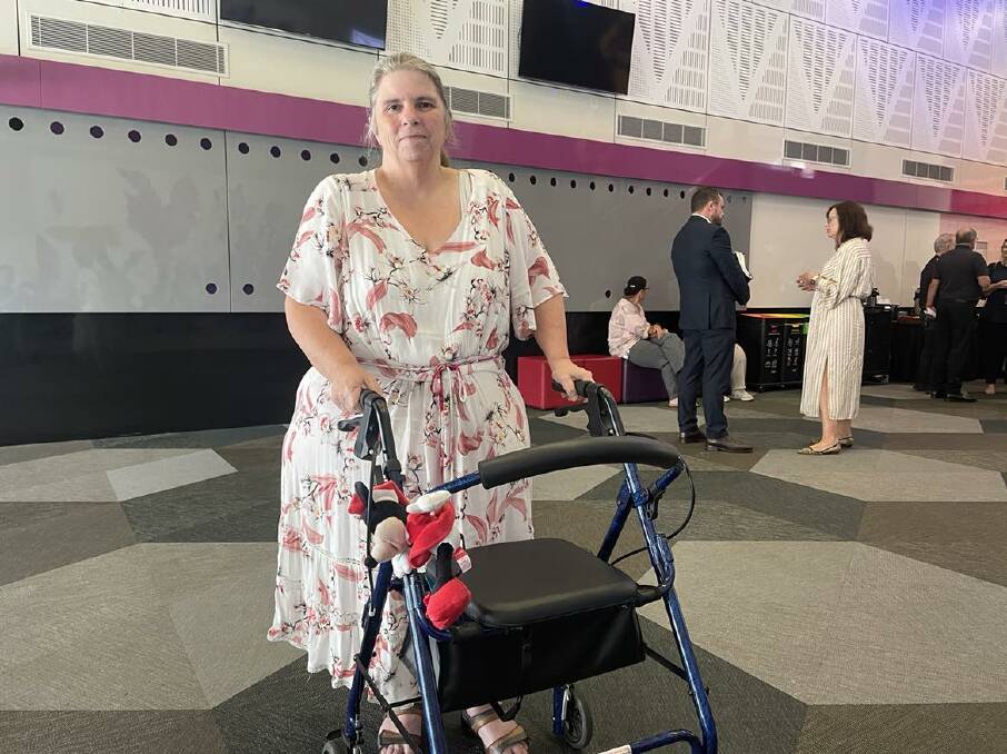 Retired customer service worker Vicki Lancaster with her walker after the Albury Wodonga Health annual meeting on Tuesday December 12.
