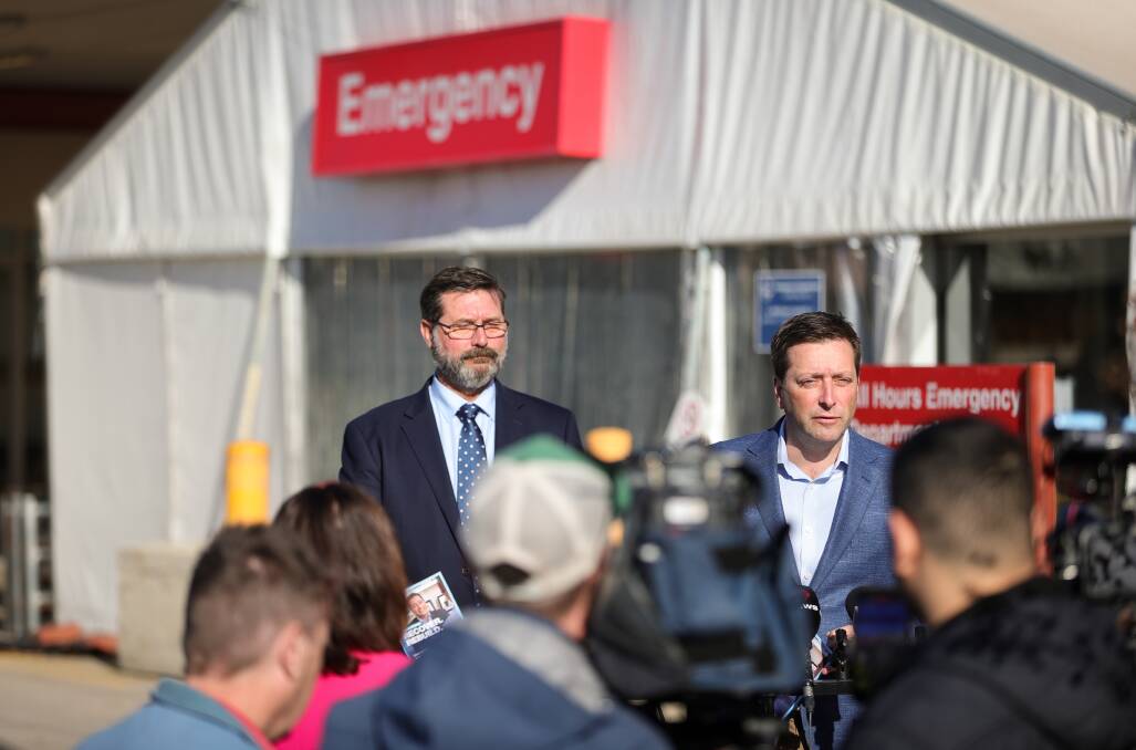 Flashback: Victorian Opposition leader Matthew Guy faces the media in June outside Wodonga hospital to announce his pledge to fund a new Border medical hub.
