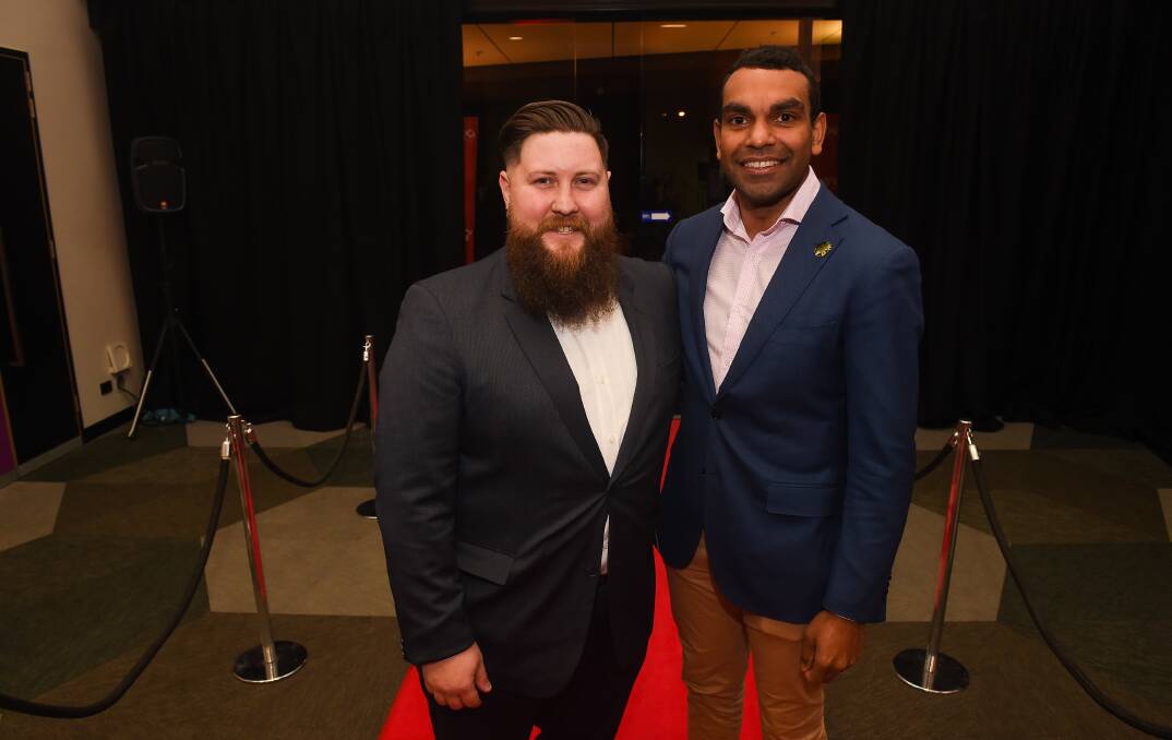 On the red carpet: Wodonga Council's youth events officer Scott Bates with guest speaker Benson Igua Saulo, who grew up in Tamworth but has Indigenous heritage from western Victoria. Picture: MARK JESSER