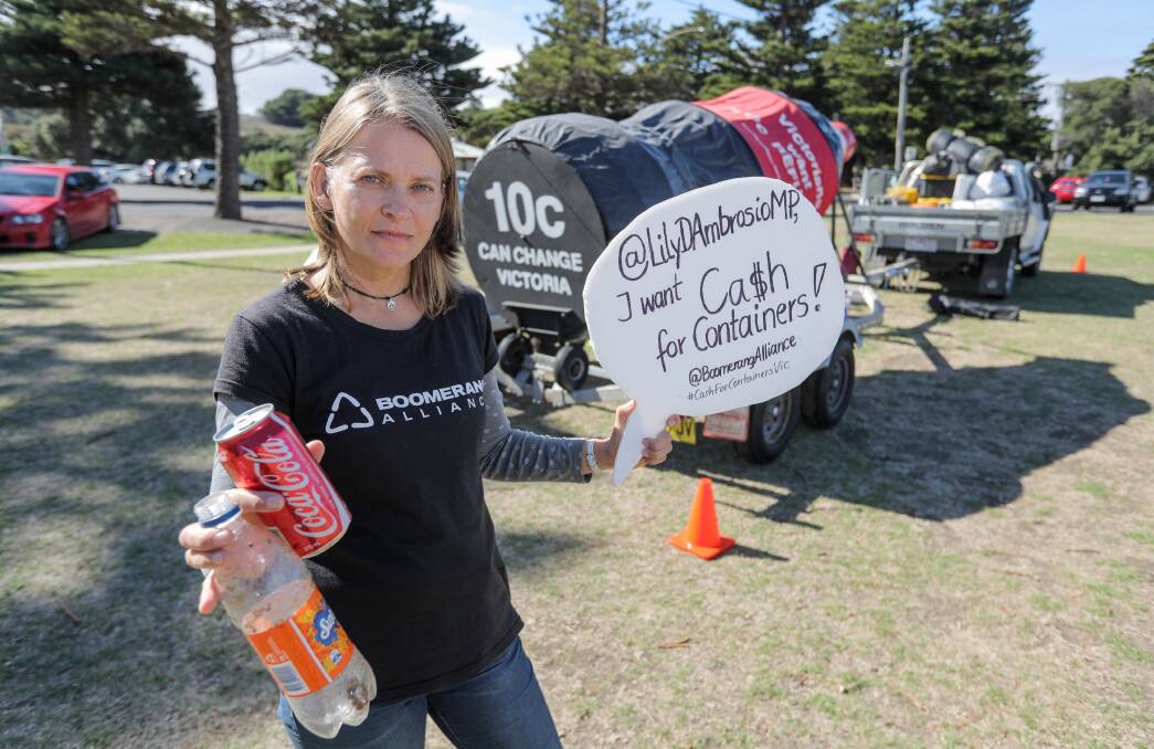 On tour: Annett Finger with the giant bottle she is taking around Victoria to promote the introduction of a container deposit scheme in the state.