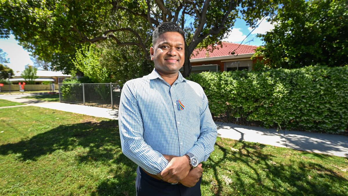 New member: Punarji Gunaratne is part of the latest Benalla Council. The multi-hued ribbon on his chest indicates he is a supporter of diversity in Victorian local government. Picture: MARK JESSER
