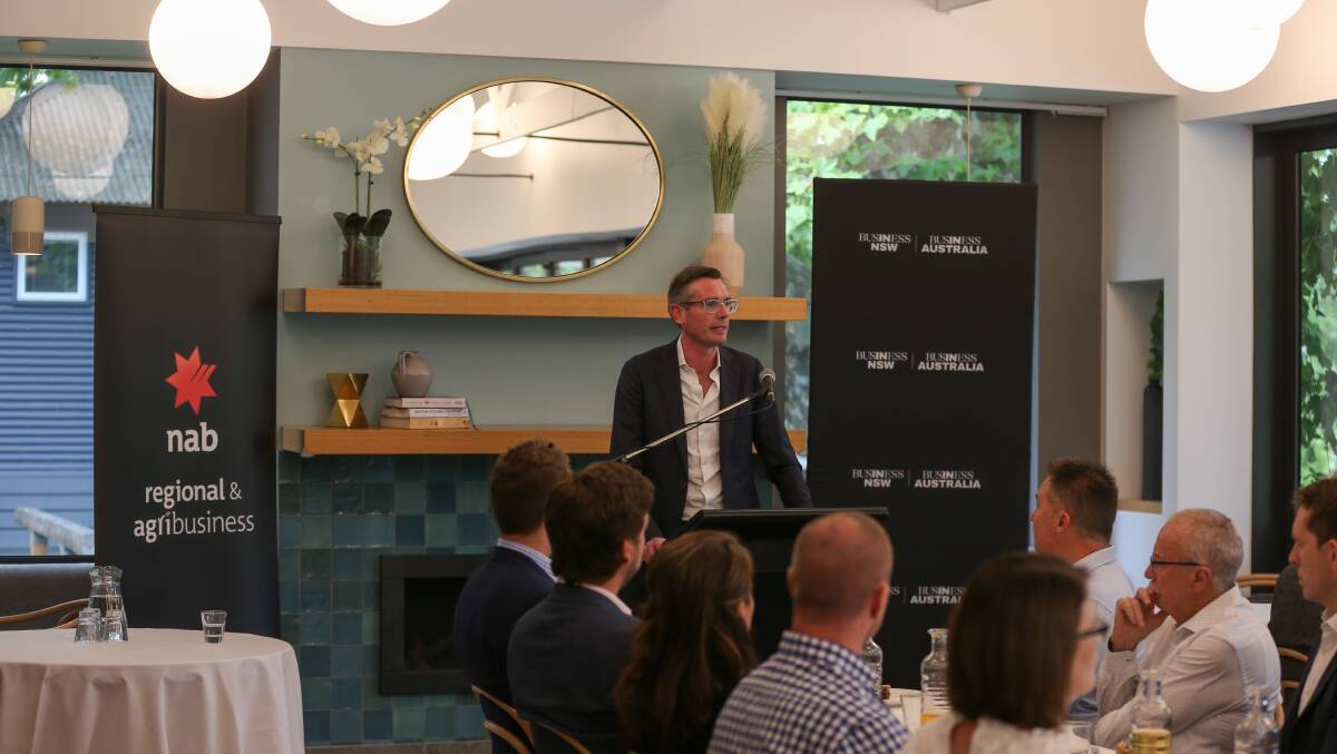 Giving direction: The NSW Treasurer Dominic Perrottet addresses a lunch at Albury's River Deck Cafe on Thursday. Guests included mayor Kevin Mack and NSW cross border commissioner James McTavish. Picture: TARA TREWHELLA