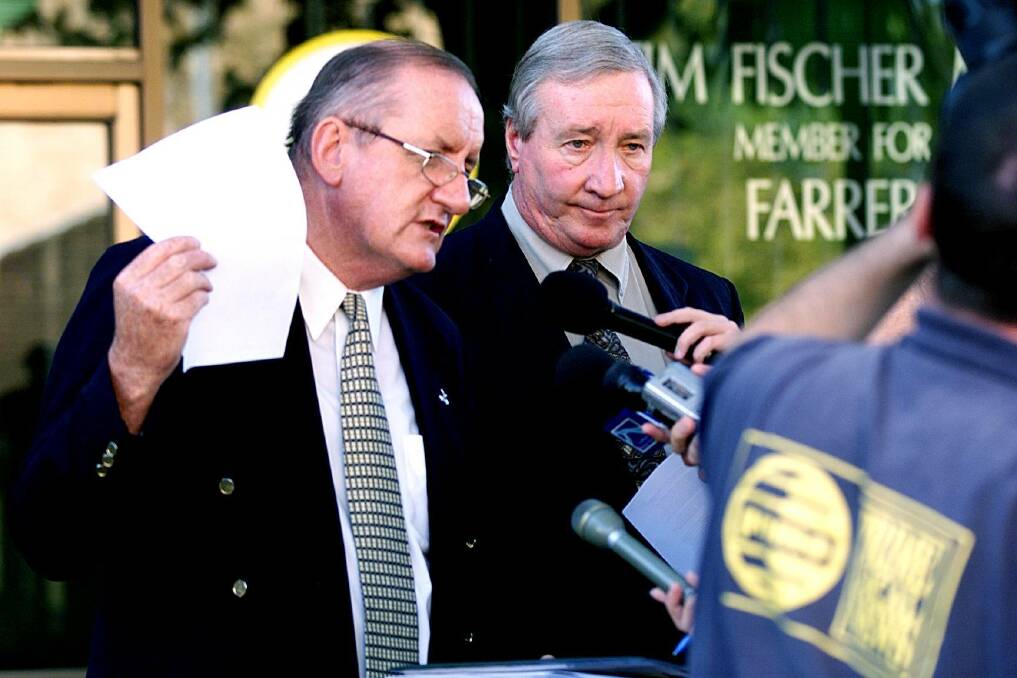 Joined at the border: Tim Fischer and Lou Lieberman as Albury and Wodonga's federal representatives speak to the media about the Hume Freeway bypass of Albury at a media conference in 2000.