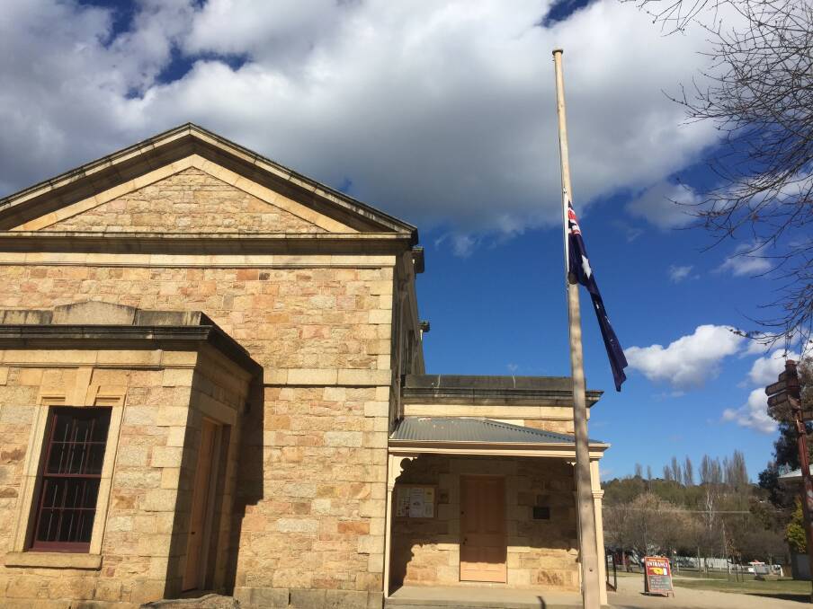 Solemn tribute: The flag lies at half-mast this week outside Beechworth's 19th century courthouse as a tribute to Ned Kelly aficionado Ian Jones.