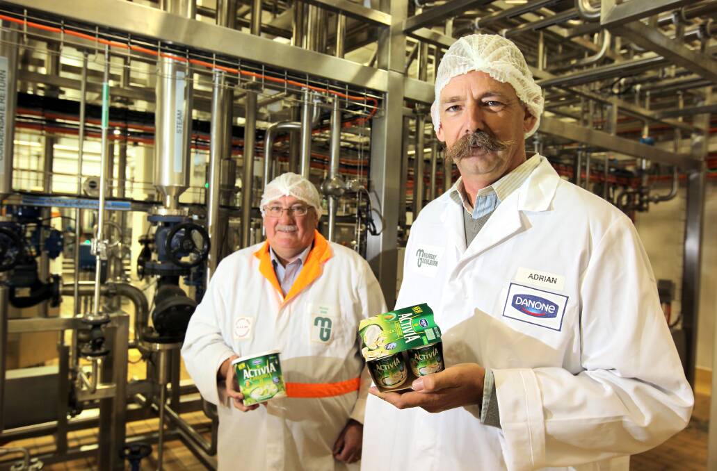 Flashback: Murray Goulburn Kiewa plant manager Doug Sims and Danone manager Adriaan van Dijk at the time of the yoghurt production beginning in 2011.