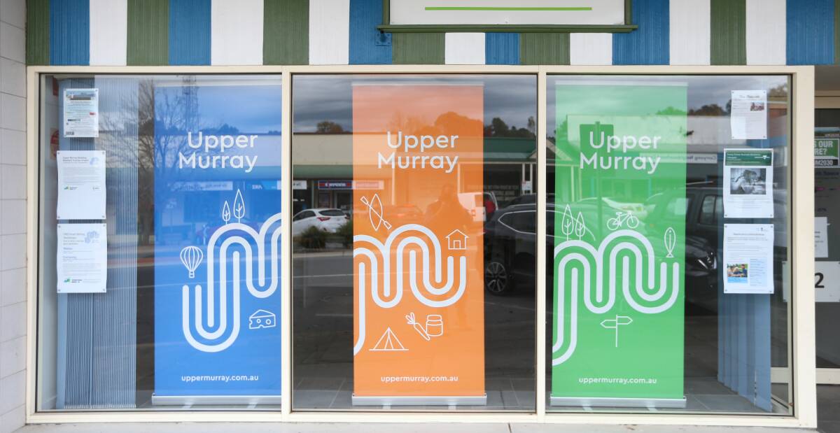 Eye-catching: The Albury-designed Upper Murray logo displayed in a shopfront in the main street of Corryong. Picture: JAMES WILTSHIRE