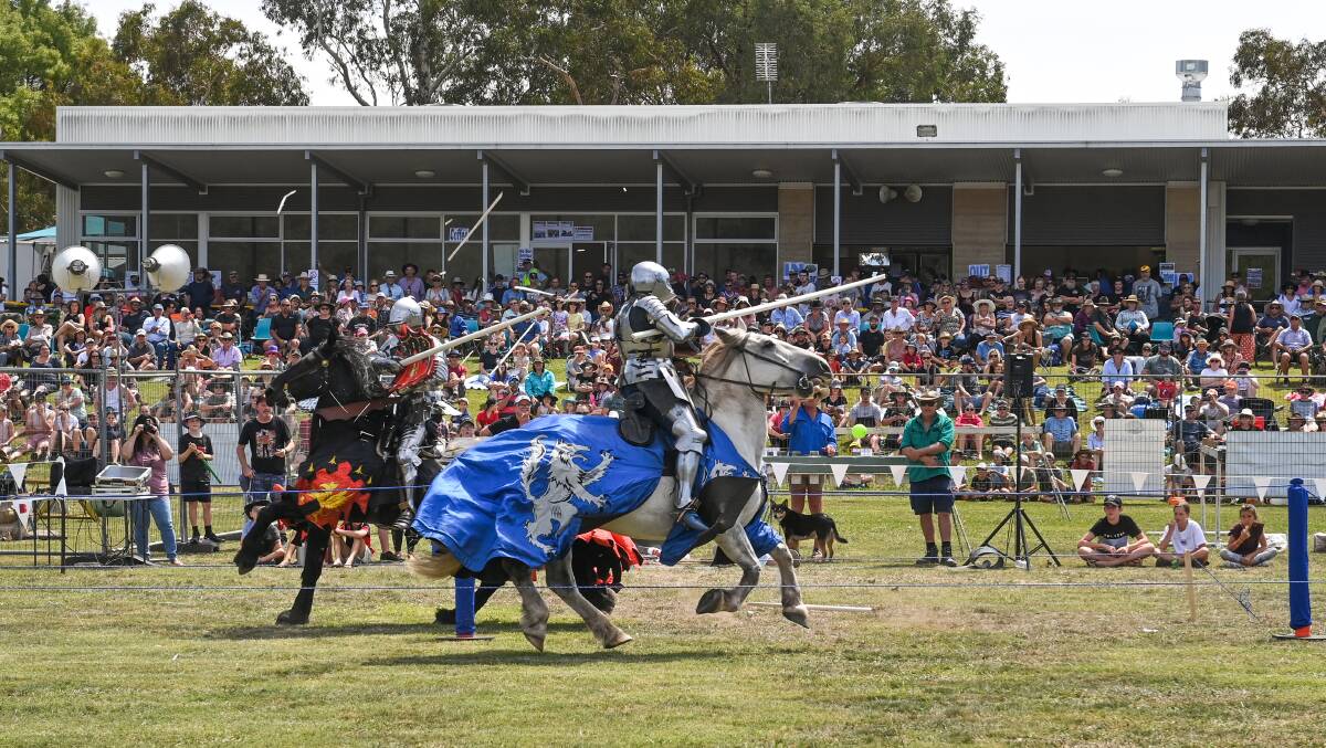 Snap to it: Would-be knights from Ballarat's Kryal Castle excited Mitta muster crowds with their jousts which saw lances broken into pieces. Picture: MARK JESSER