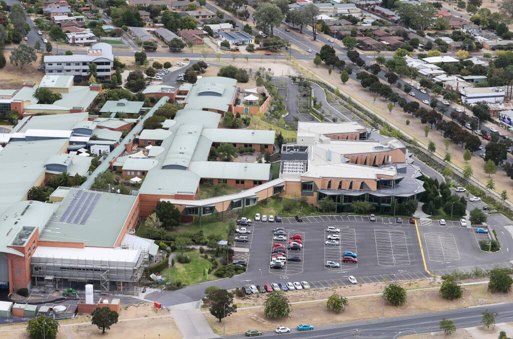 An aerial view of Albury hospital with the medical wards in the middle ground between the main entrance to the left and the cancer centre to the right. Picture by Mark Jesser