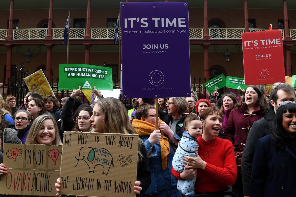 Successful: Those arguing for the decriminalisation of abortion in NSW, such as these protesters outside Parliament House in Sydney this week, welcomed the vote on Thursday night to remove it from the Crimes Act. 