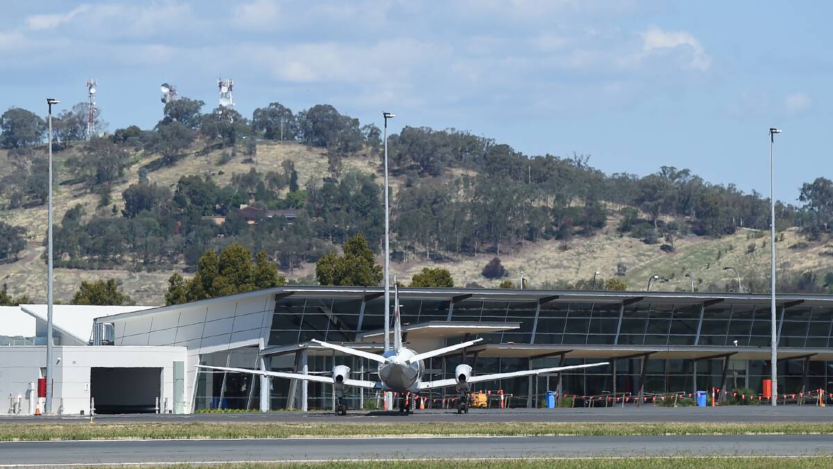 In port: A Regional Express sits near the terminal at Albury airport on Friday. Picture: MARK JESSER