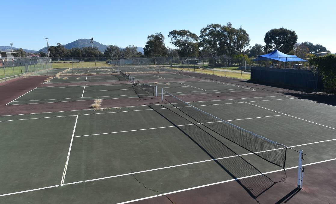 In limbo: The tennis courts at Birallee that council had agreed to provide $5000 towards, on the basis they were open to the public.