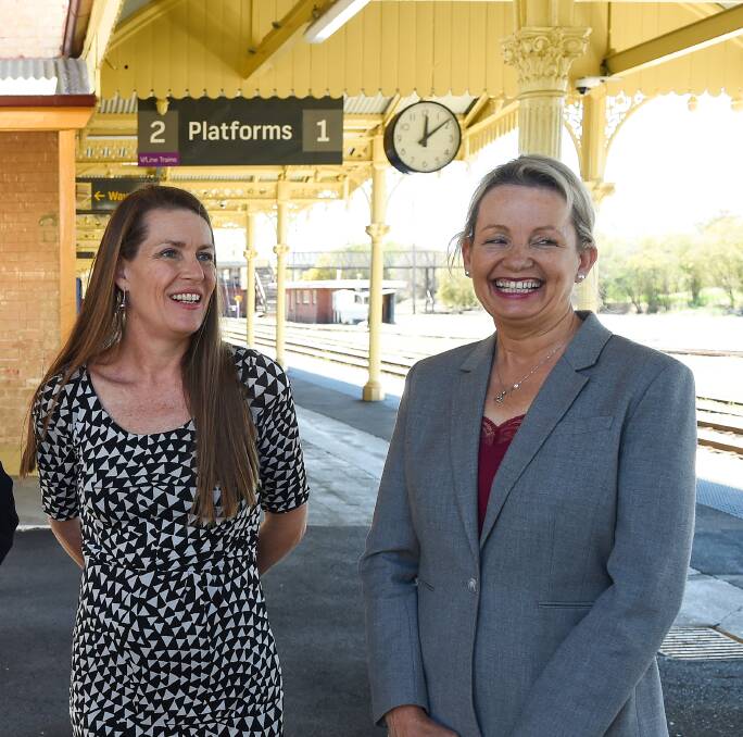 On board: Perin Davey with Sussan Ley at Albury railway station last year for a funding announcement. They are now in government together as Coalition parliamentarians. Picture: MARK JESSER 
