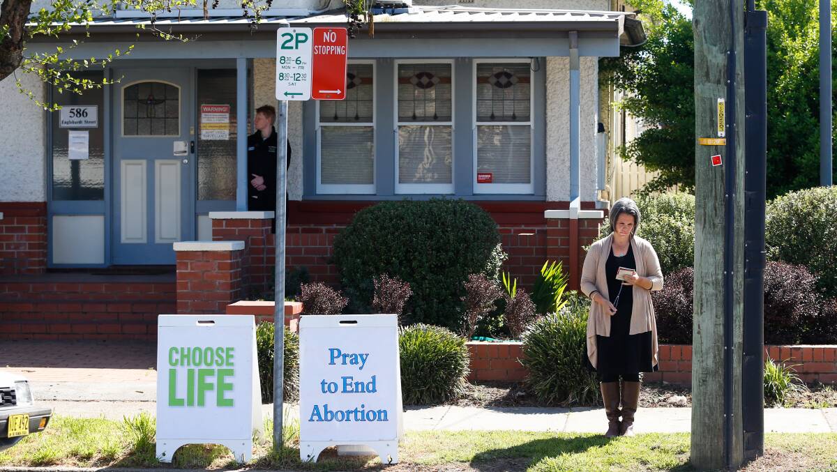 Not permissible: Activities such as gathering outside abortion clinics and placing signs in front of medical rooms for fertility services are no longer allowed in NSW.