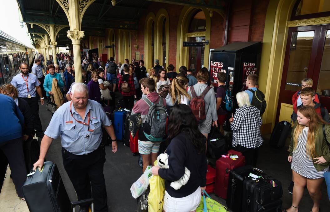 Limited hours: Trainlink staff at Albury railway station which has experienced a slashing in opening times for its ticket office because of a shortage in staff and a need for training.