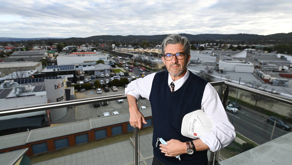 Bubble trouble: Garry Zauner atop his company tower at Lavington. He has been left counting the high cost of Victoria's border restrictions for his workers and projects. Picture: MARK JESSER