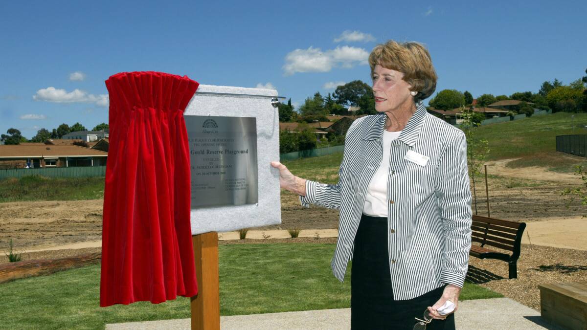 In 2005, Patricia Gould was involved in opening a reserve named in her honour in West Albury. Here she reads the plaque detailing the launch of Patricia Gould Reserve.