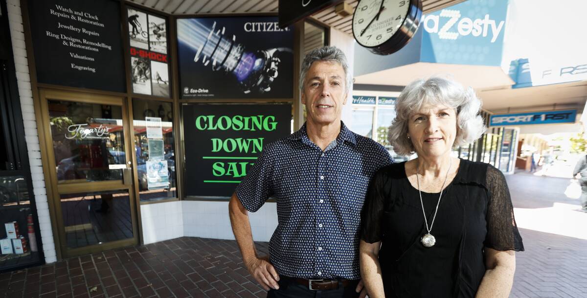 Timed out: Michael and Glenda Fogarty are closing their High Street shop after 25 years of trading in Wodonga. Picture: JAMES WILTSHIRE