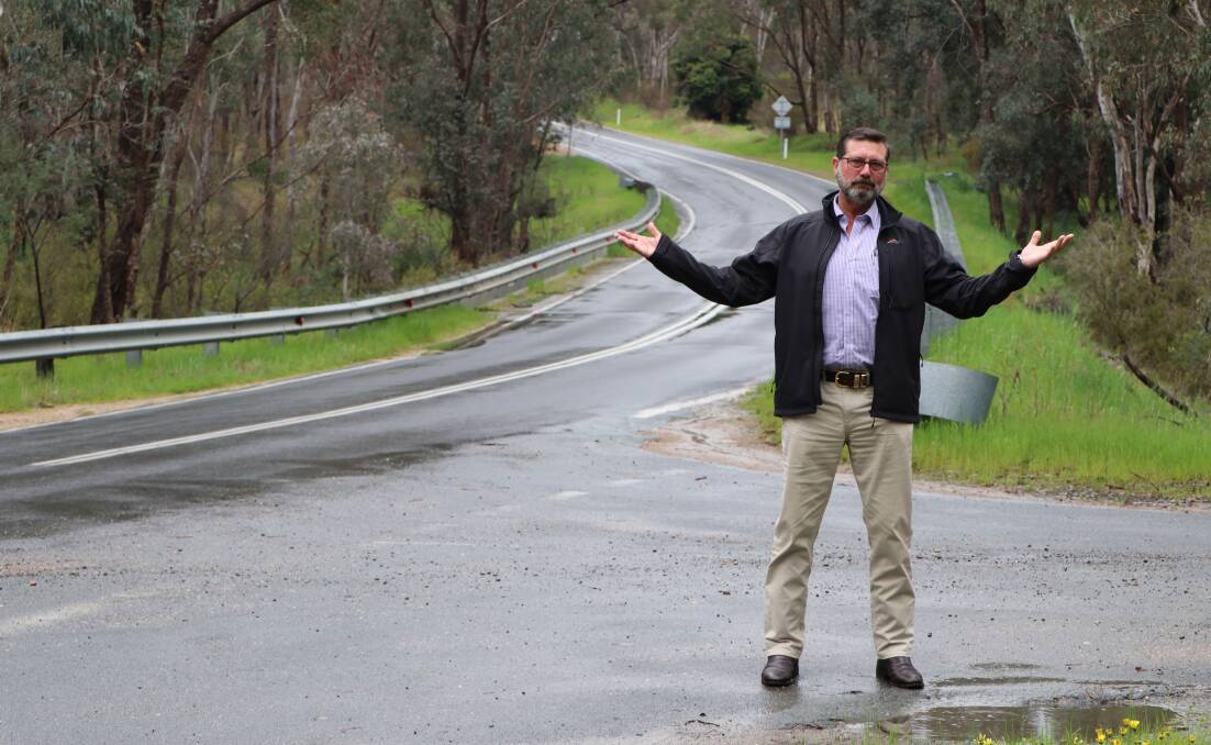 Bill Tilley on the Beechworth-Chiltern Road which is among many routes across the region hit by potholes. Picture supplied