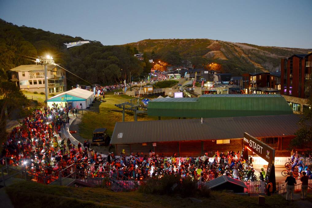 Ready to wheel off: The 1500 riders prepare to leave Falls Creek as dawn breaks. Picture: CHRIS HOCKING 