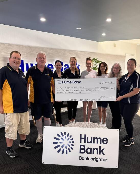 Albury Good Friday Appeal helpers with their $100,000 total raised through donations collected across the city and surrounds. Picture from Facebook
