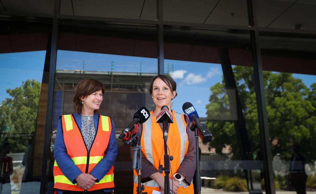 Parliamentary pair: Victorian government ministers Mary-Anne Thomas and Jaala Pulford speak to the media in Wodonga on Tuesday before meeting business representatives. Picture: JAMES WILTSHIRE