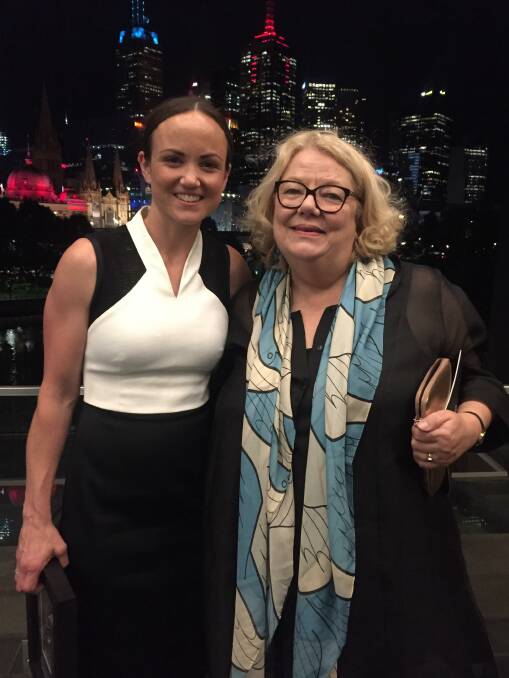 Prized pair: Daisy Pearce and Alana Johnson in Melbourne on Monday night at a gathering where they were named distinguished alumni by La Trobe University.