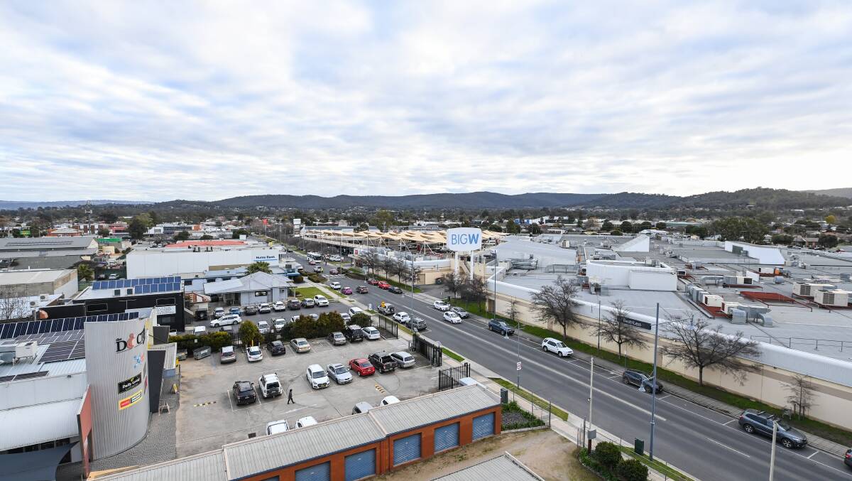 A bird's eye view looking south towards Griffith Road and Lavington Square. The council's retail plan noted the imposing shopping centre wall which ensures it is shut-off from its surrounds. 
