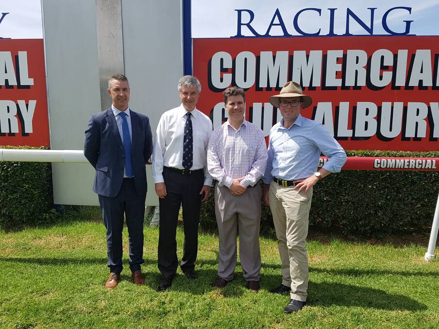 Winning post: Steve Hetherton, Albury MP Greg Aplin, Liberal Party candidate for Albury Justin Clancy and Adam Marshall at Albury racecourse on Thursday.