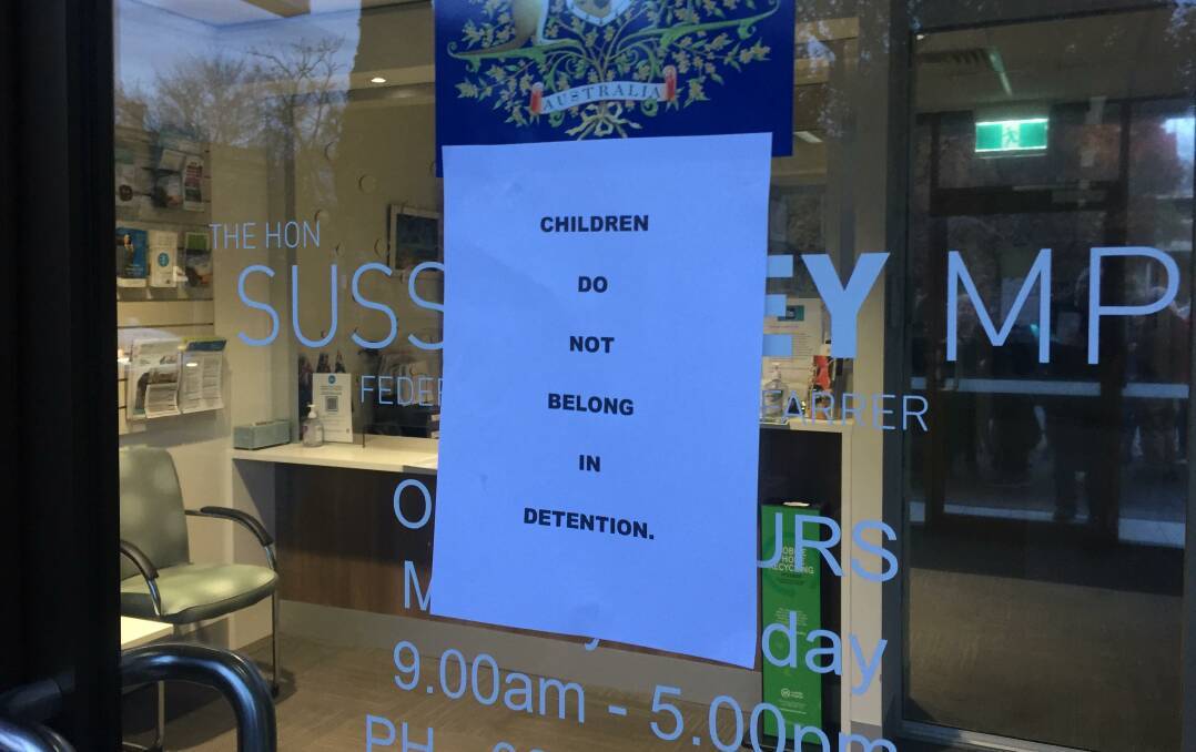 Message clear: Sign placed on the front door of Ms Ley's office by refugee advocate Dorothy Simmons.